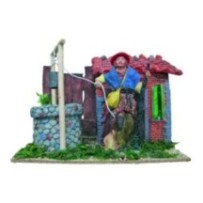 Aldeano en Pozo con Cubo en Resina | Figura para Belén con Movimiento y Luz (19cm - 230V)